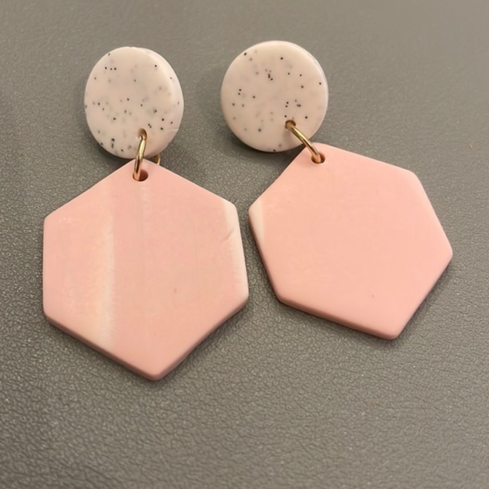 Pink and white dangle earrings